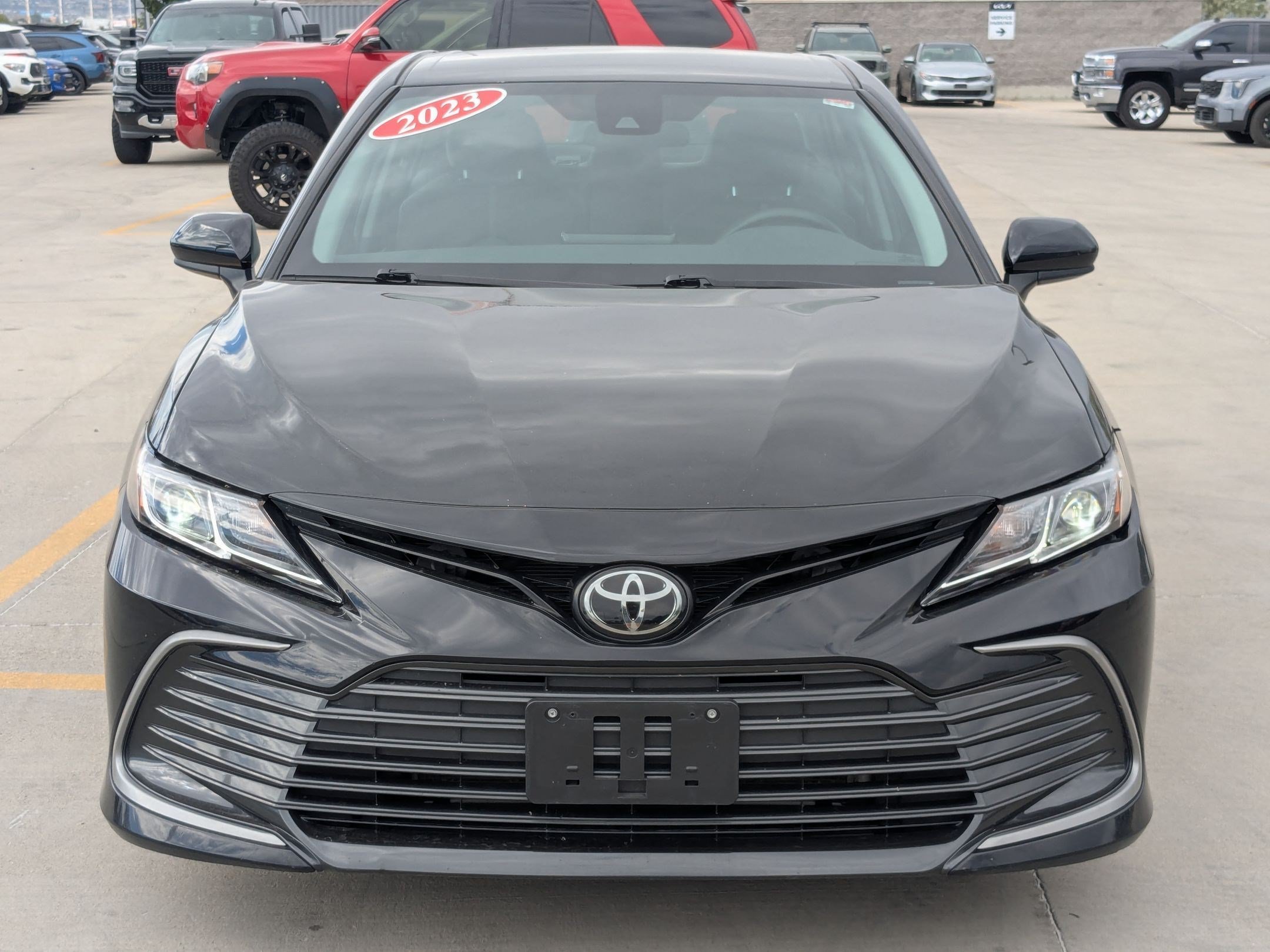 Used 2023 Midnight Black Metallic Toyota LE image 9