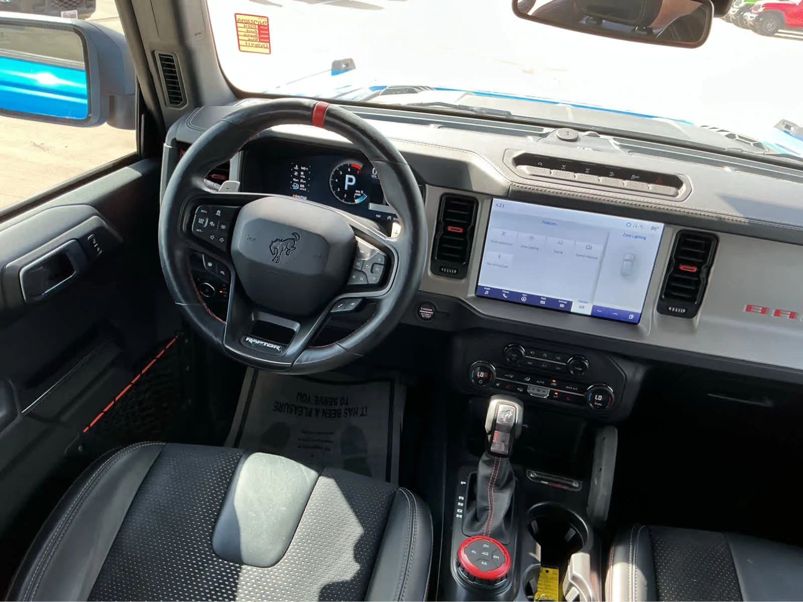 Used 2024 Velocity Blue Metallic Ford Raptor image 24