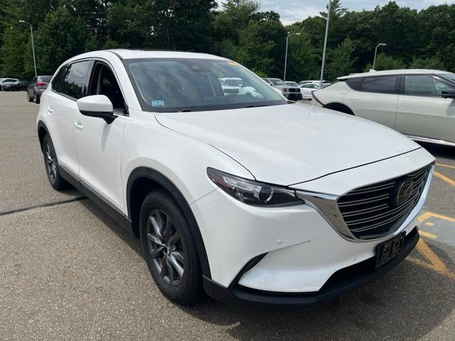 Used 2020 Snowflake White Pearl Mica Mazda Touring image 1