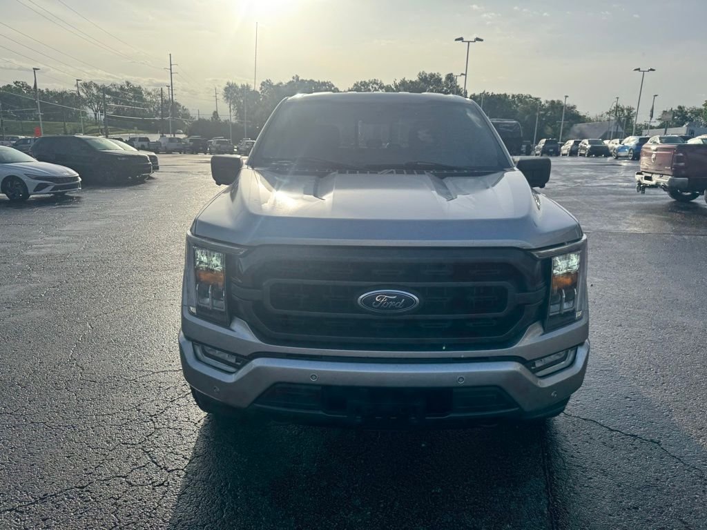 Used 2021 Ford F-150 XLT with VIN 1FTFW1E84MFA33406 for sale in Kansas City