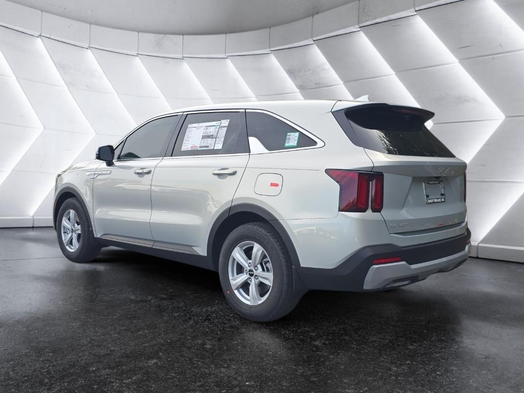 New 2026 Ivory Silver Kia LX image 3