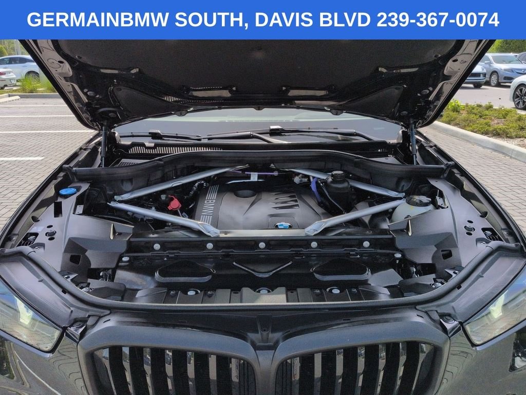 Certified Used 2026 Black Sapphire Metallic BMW sDrive40i image 14