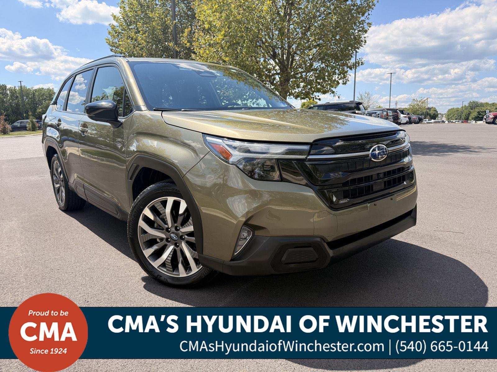 Used 2025 Autumn Green Metallic Subaru Touring image 1