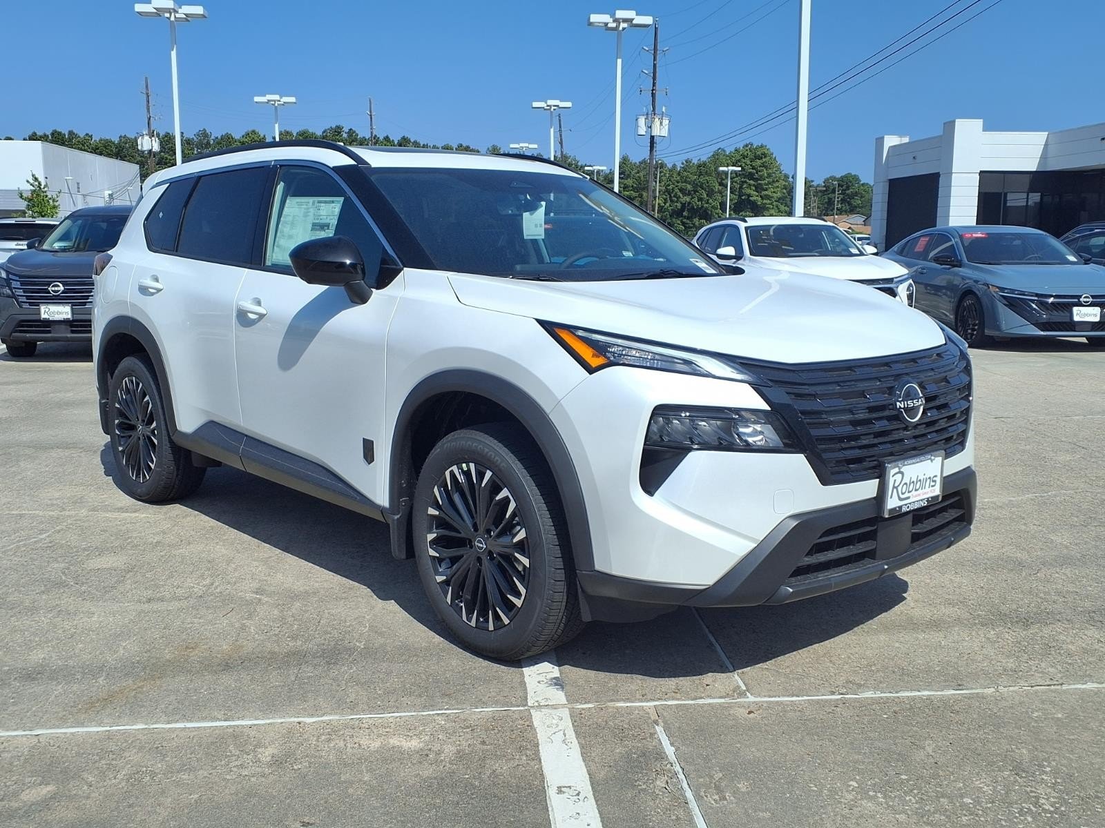 2026 Nissan Rogue Dark Armor™ White at Robbins Nissan