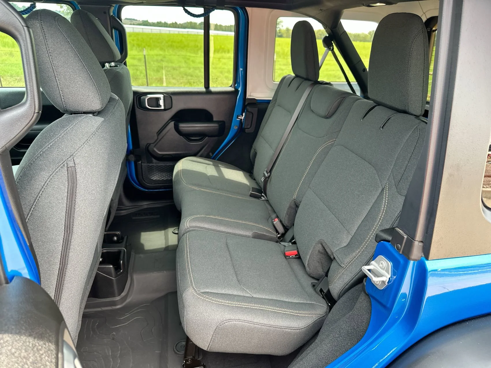 Used 2024 Hydro Blue Pearl Coat Jeep Sport image 21