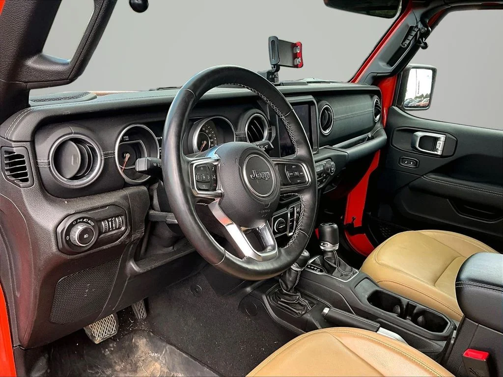 Used 2018 Orange Jeep Unlimited Sahara image 14