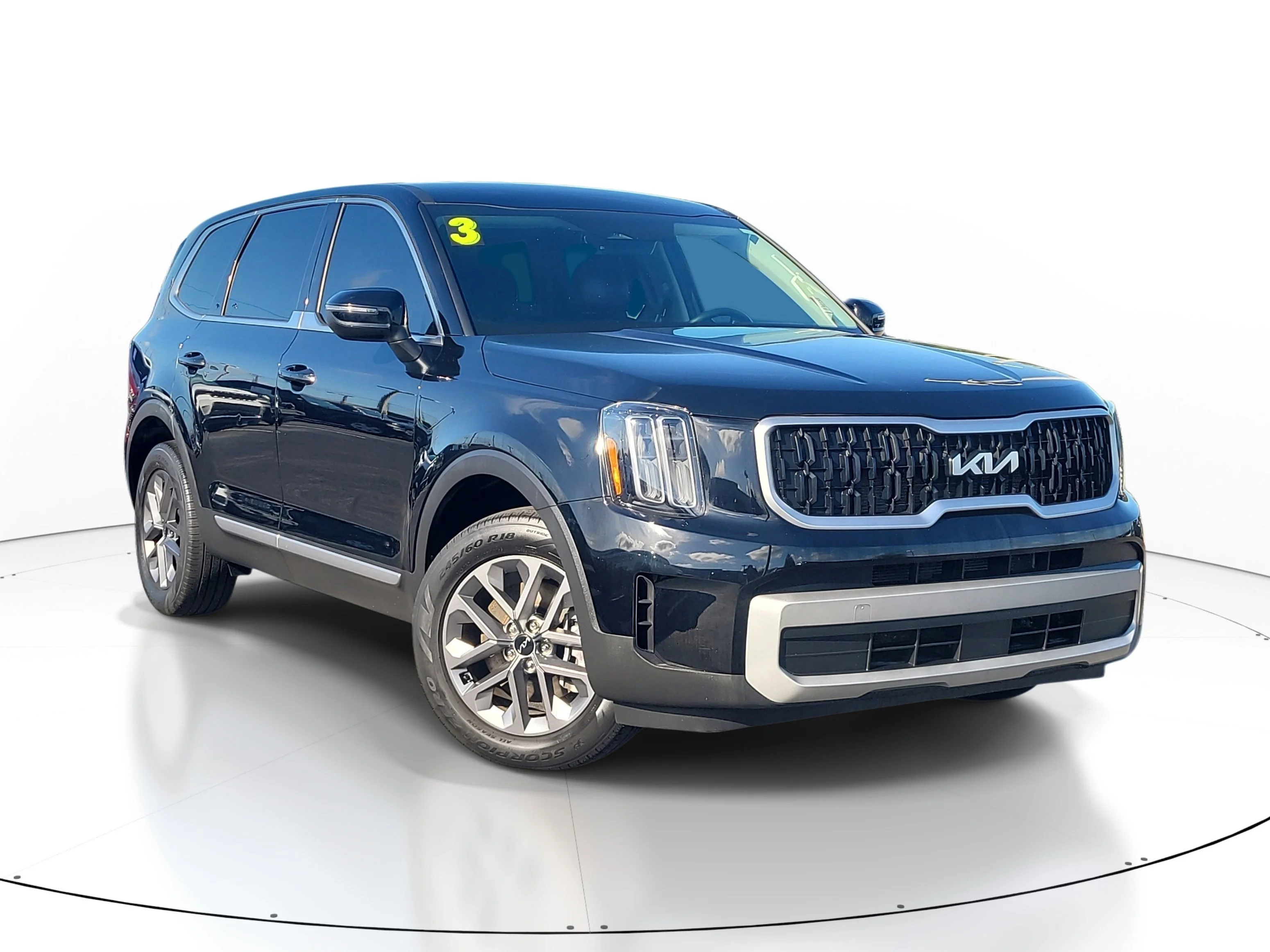 Used 2023 Ebony Black Kia LX image 1
