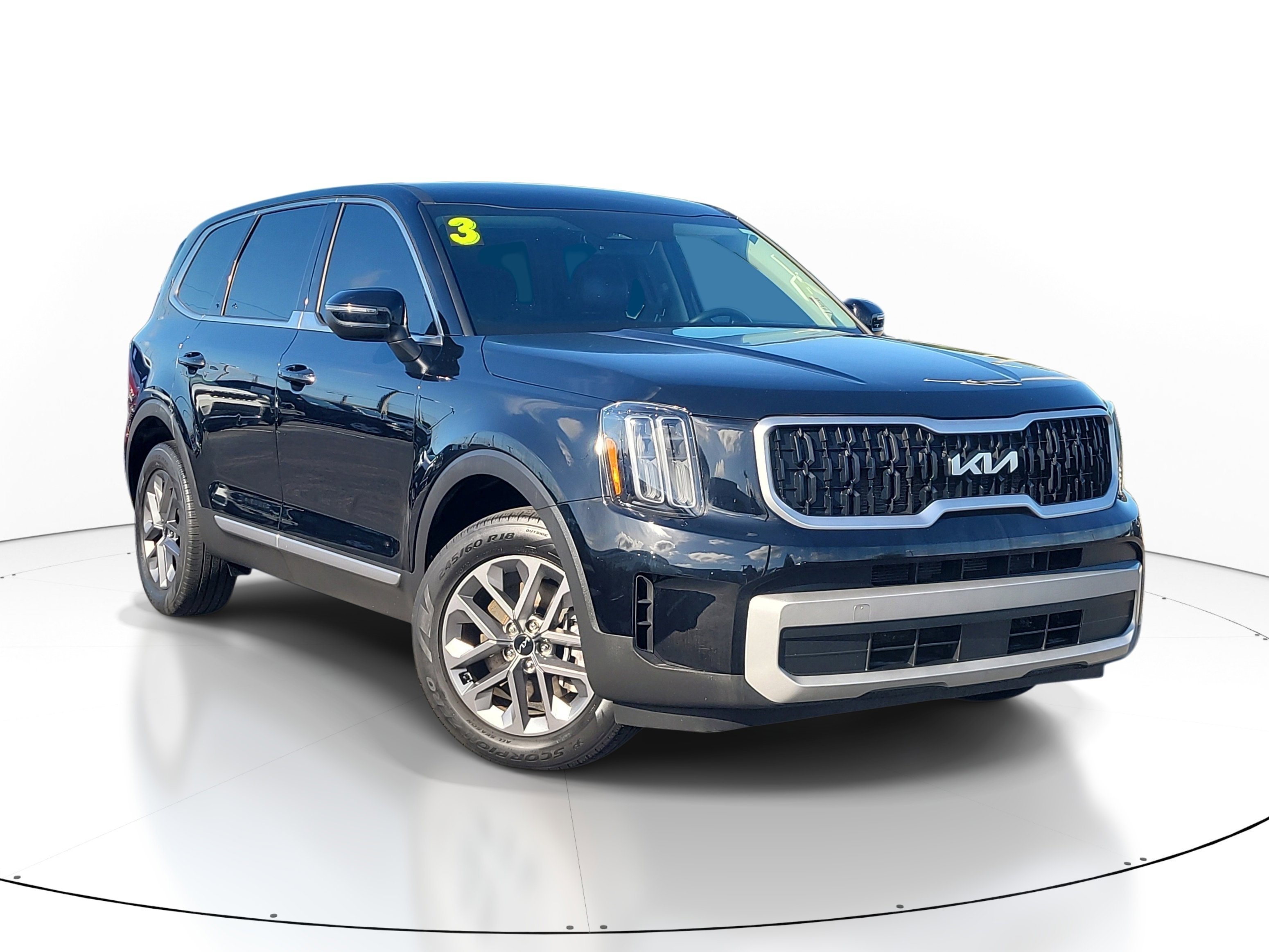 Used 2023 Ebony Black Kia LX image 1
