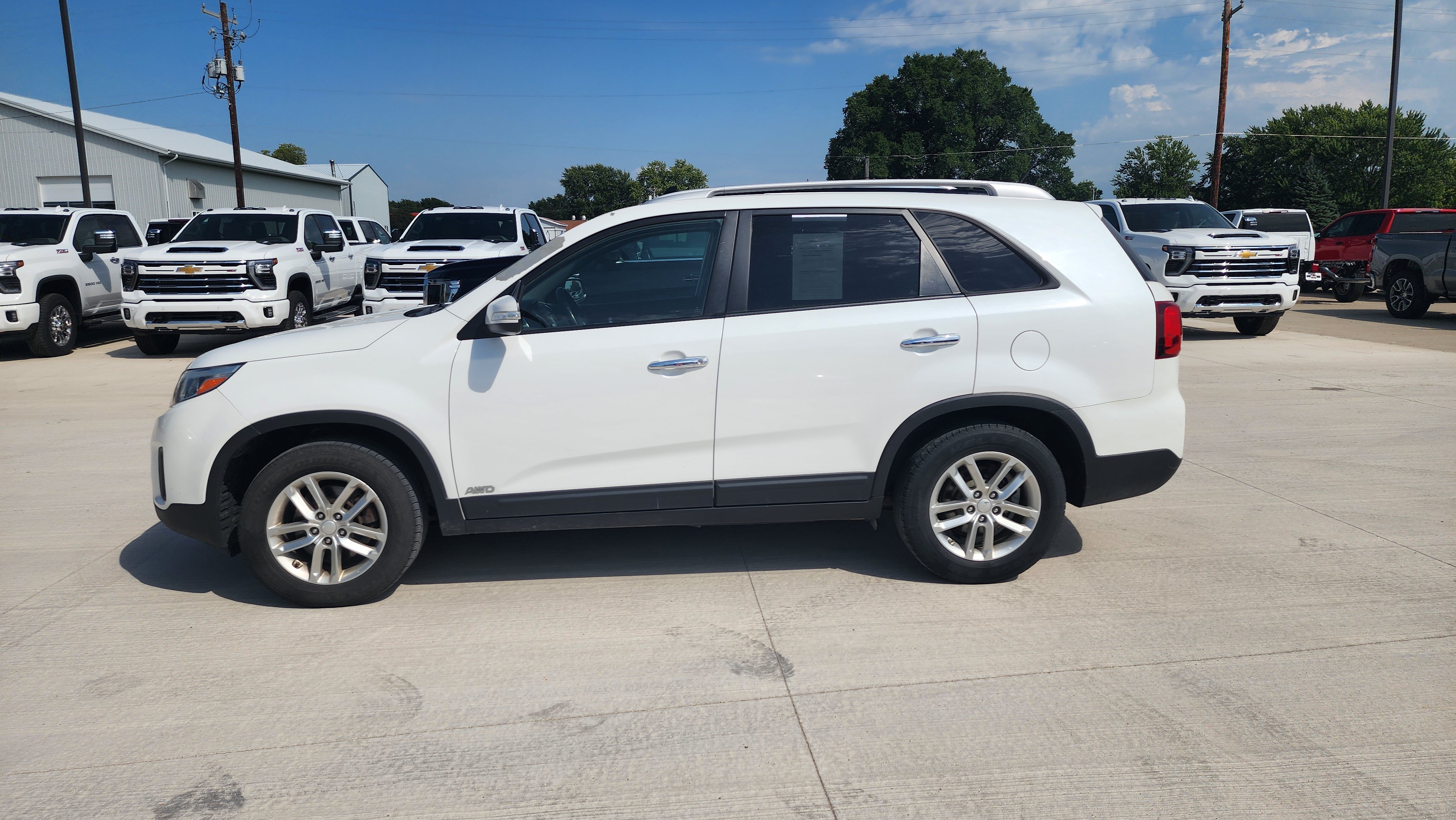 Used 2014 Kia Sorento LX with VIN 5XYKTCA66EG525201 for sale in Lake City, IA