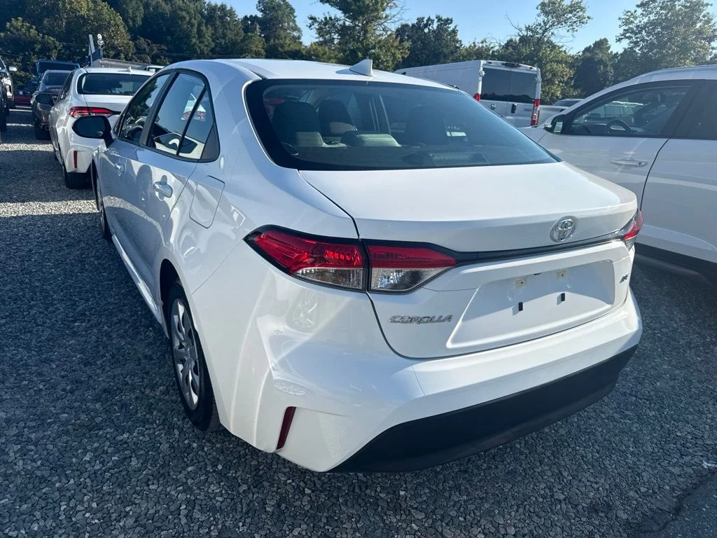 Used 2025 White Toyota LE image 4