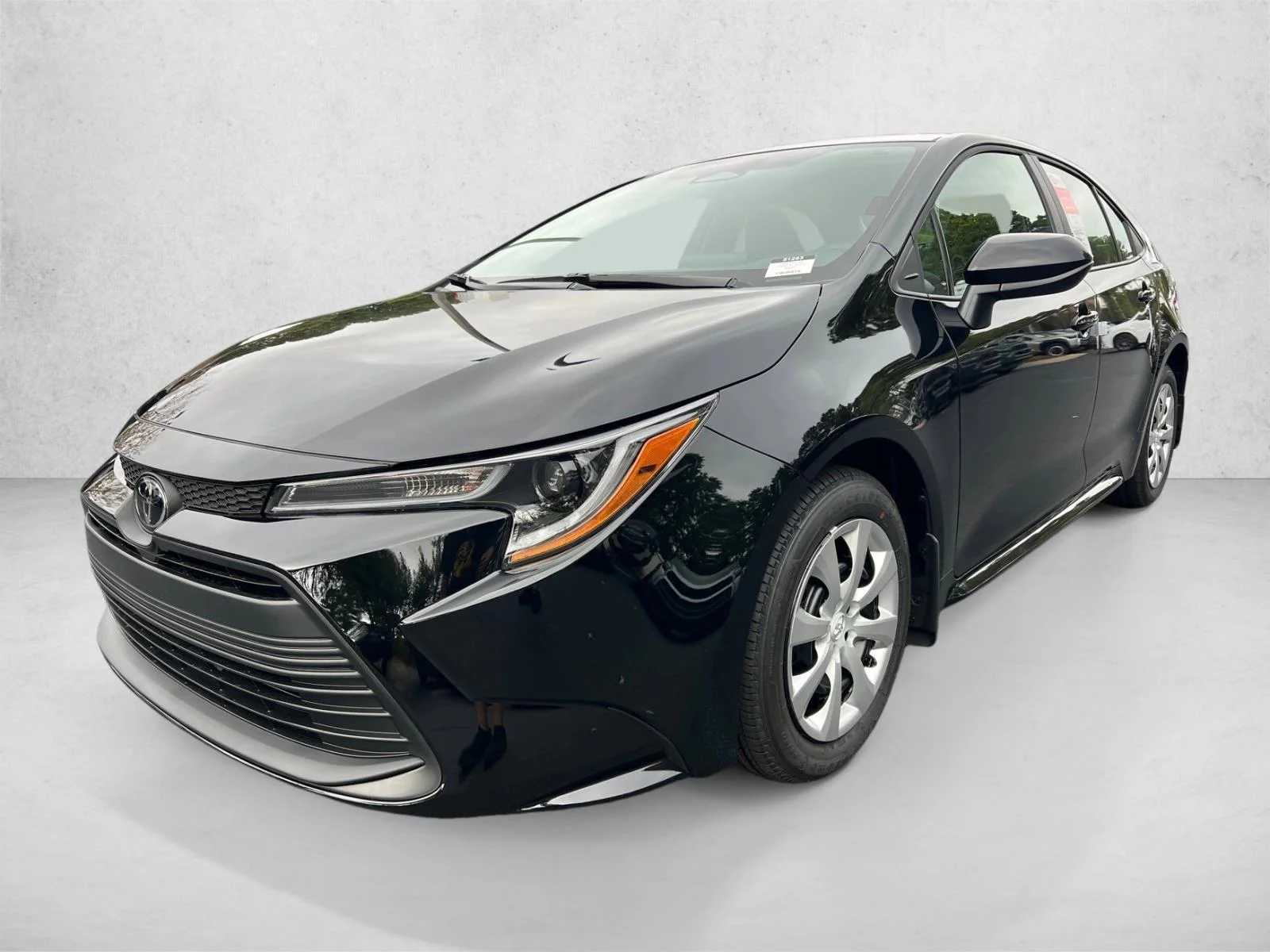 New 2026 Midnight Black Metallic Toyota LE image 7