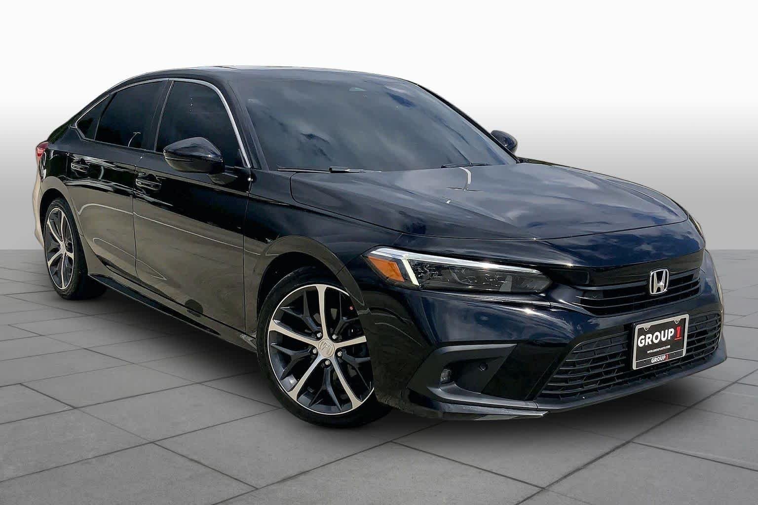 Used 2024 Crystal Black Pearl Honda Touring image 3