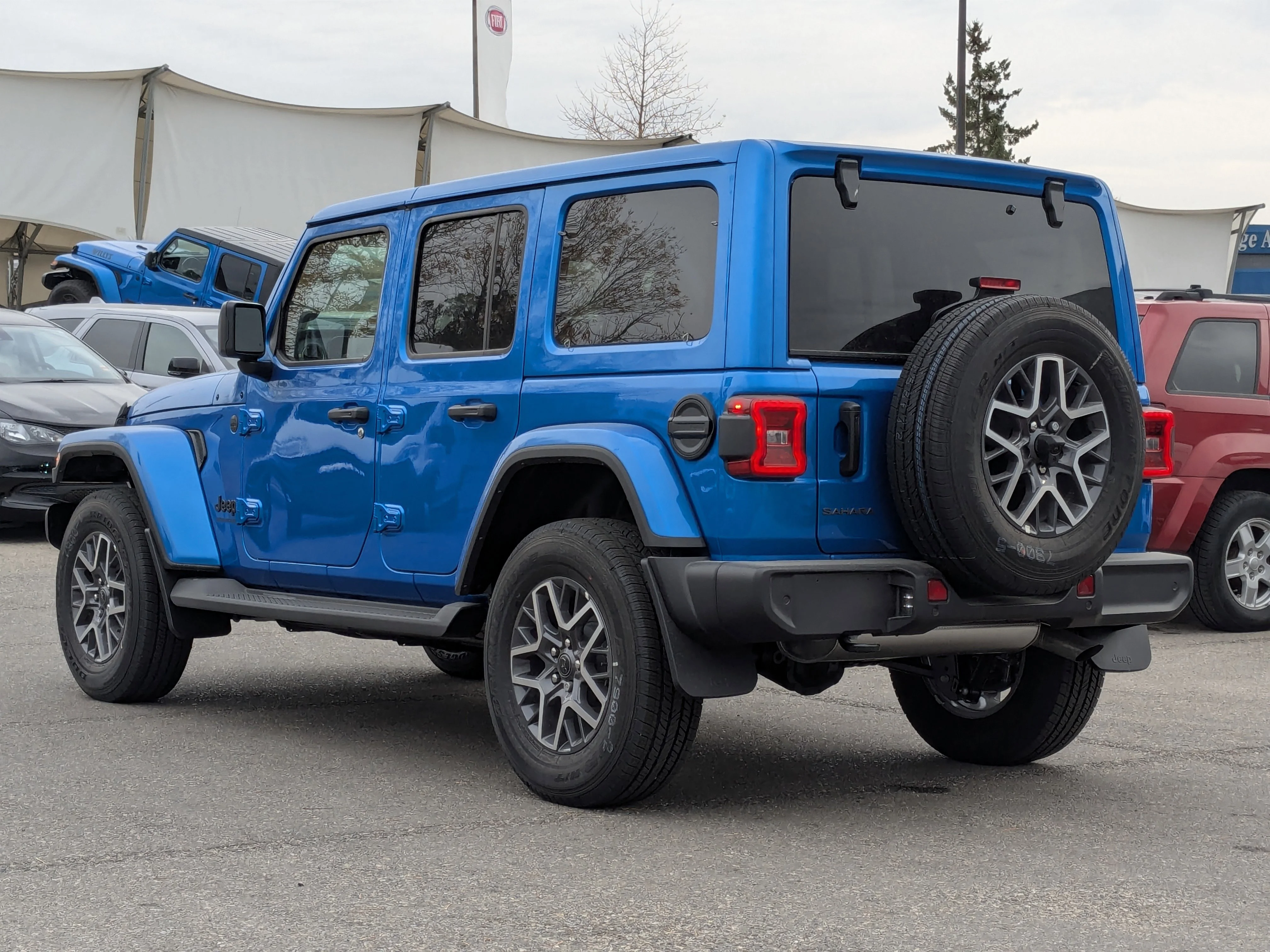 New 2025 Blue Jeep Sahara - - Adaptive Cruise - 12.3inch display - Blind Spot Mon - Body Color 3 Piece HT & Tons More! image 6