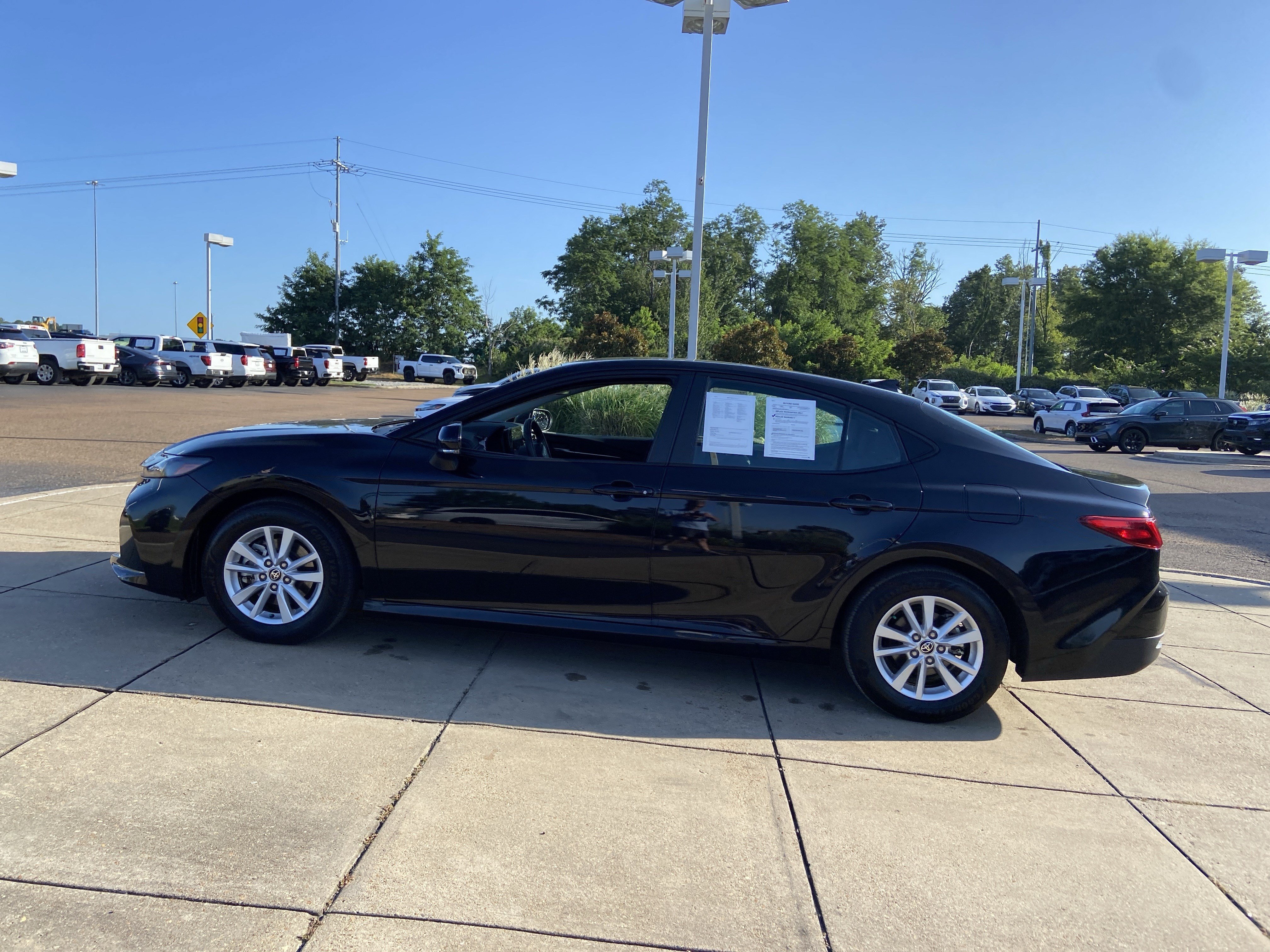 Used 2025 Midnight Black Metallic Toyota LE image 9