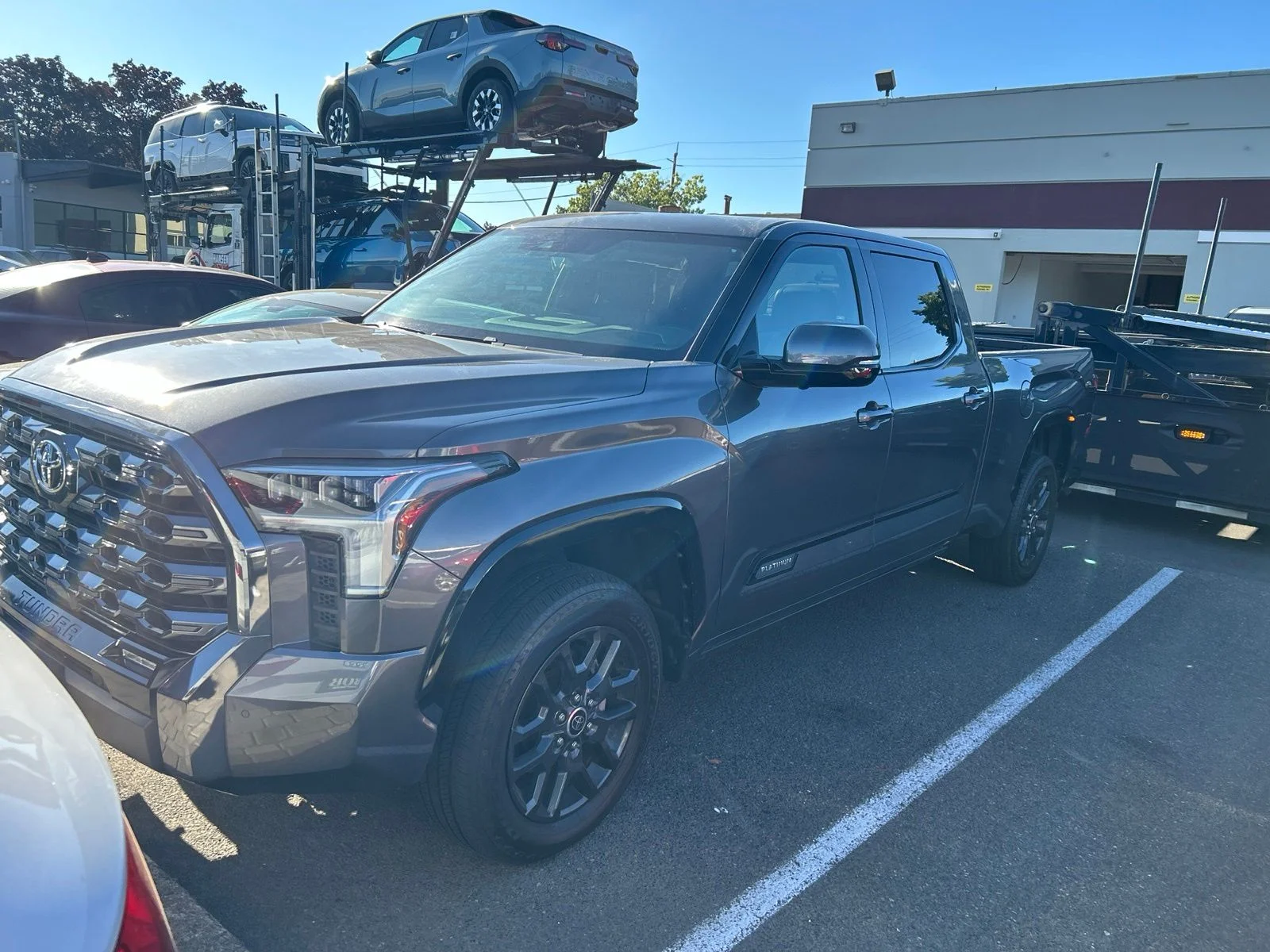 Used 2023 Magnetic Gray Metallic Toyota Platinum image 1