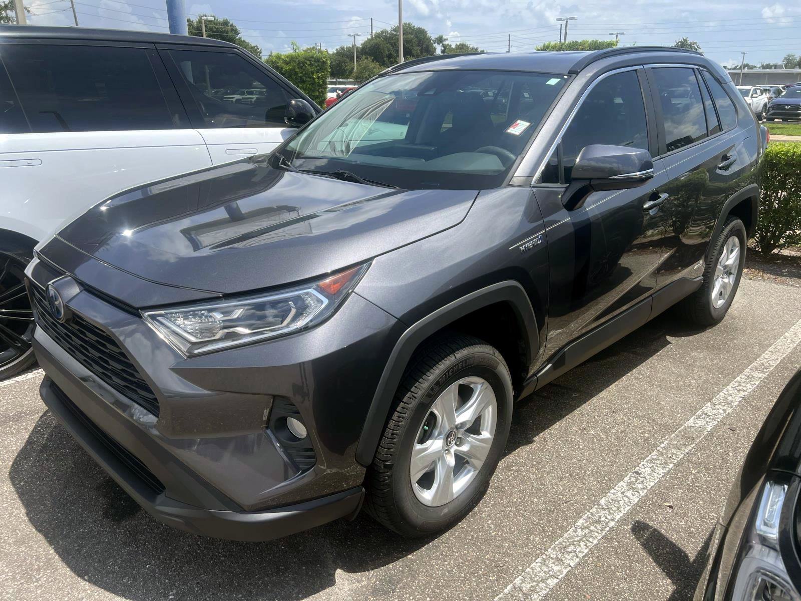 Used 2021 Magnetic Gray Metallic Toyota Hybrid XLE image 1