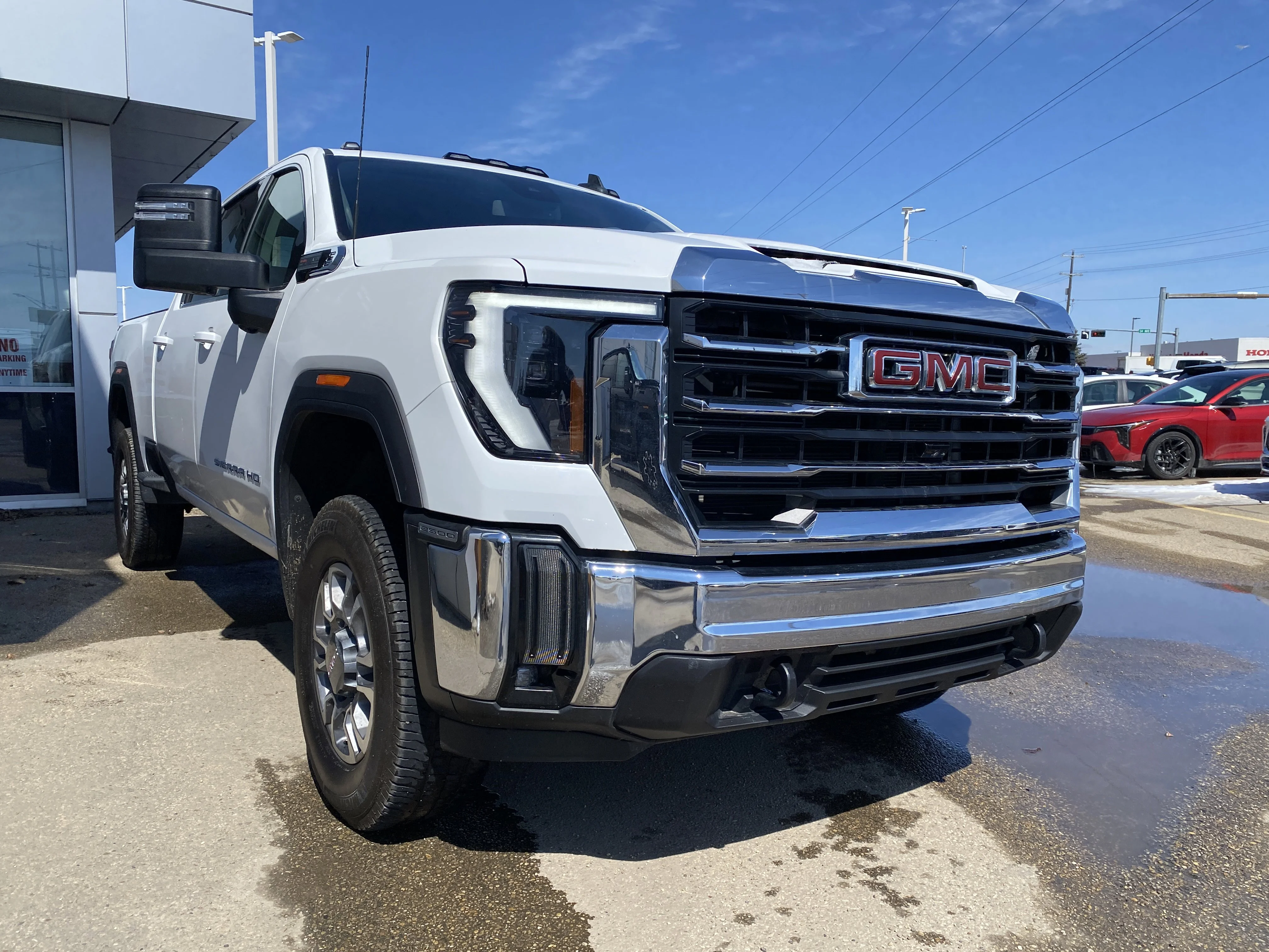 Used 2024 White GMC Crew Cab SLE image 6