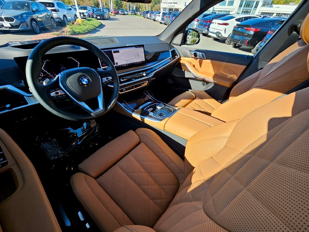 Certified Used 2026 Tanzanite Blue II Metallic BMW xDrive40i image 24