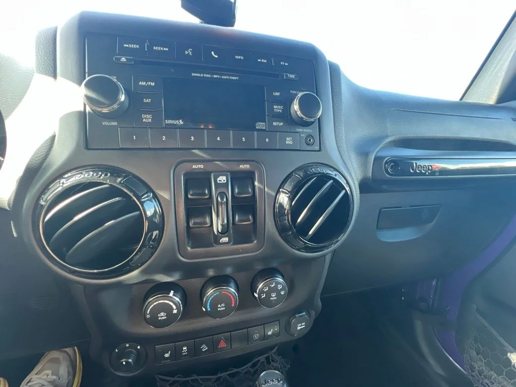 Certified Used 2016 Purple Jeep Unlimited Sahara image 31