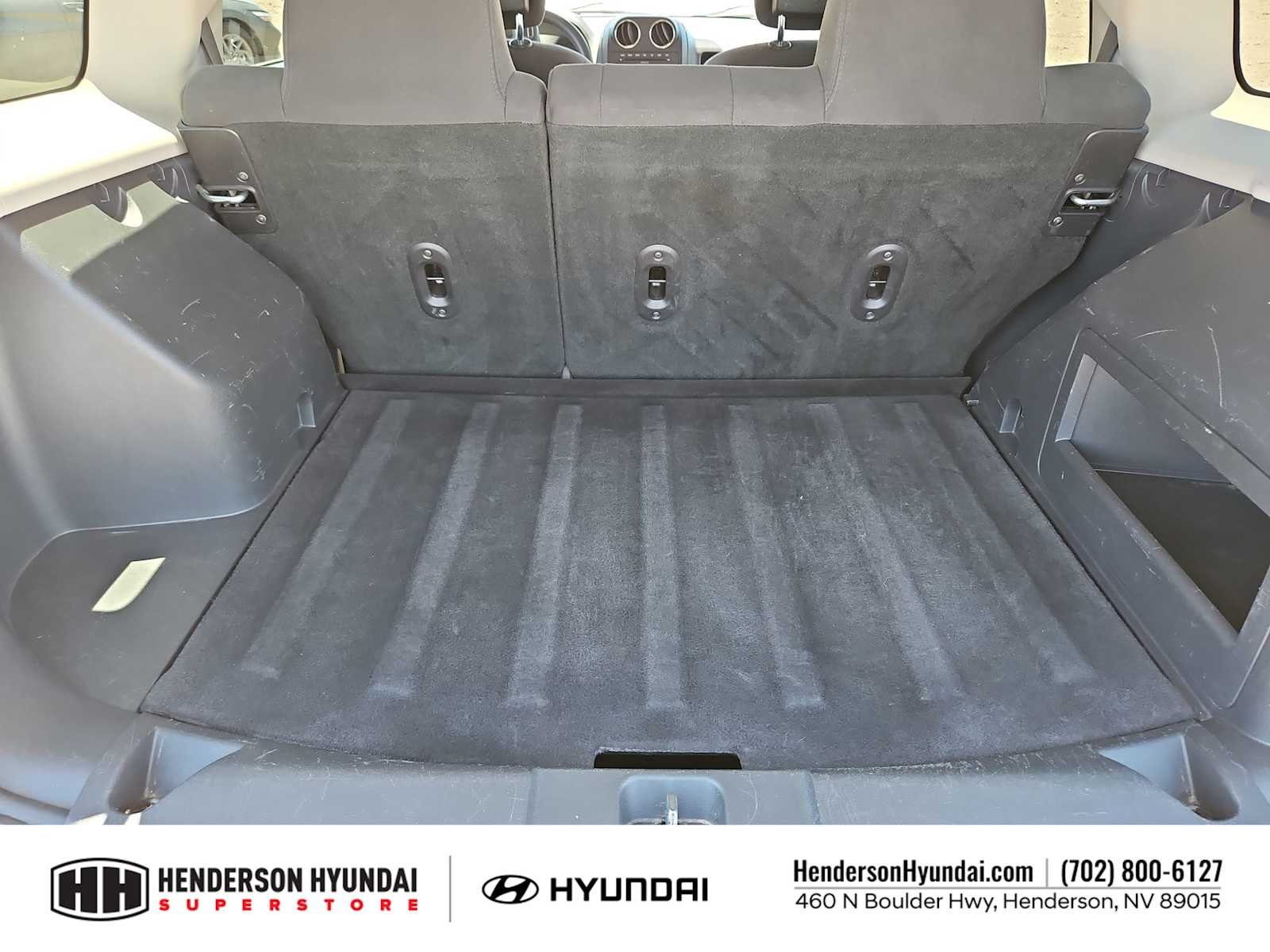 Used 2011 Bright Silver Metallic Jeep Sport image 32