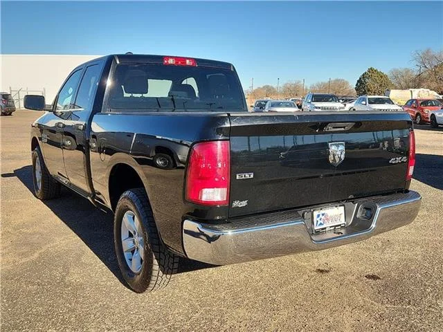 Used 2024 Black Clearcoat RAM SLT 4x4 Quad Cab 6.3 ft. box 140 in. WB image 3