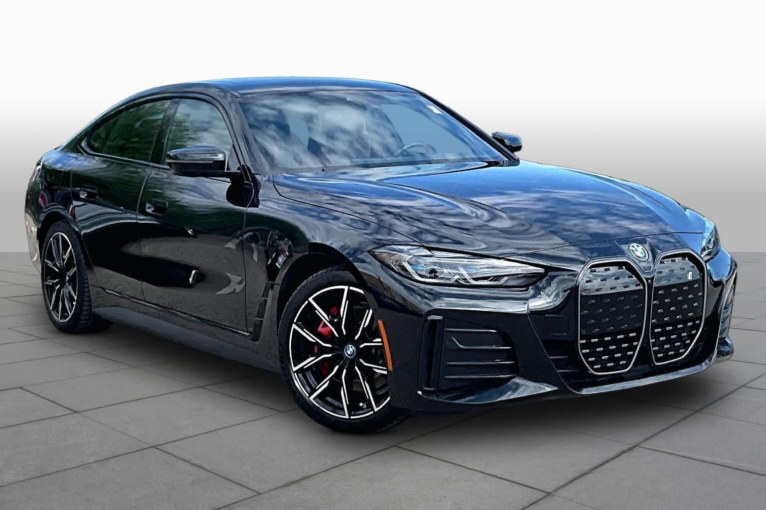 Used 2023 Black Sapphire Metallic BMW eDrive40 image 2