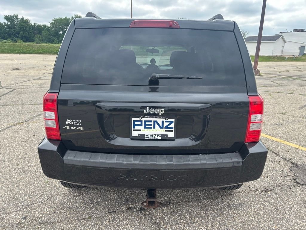 Used 2010 Black Jeep Sport image 8