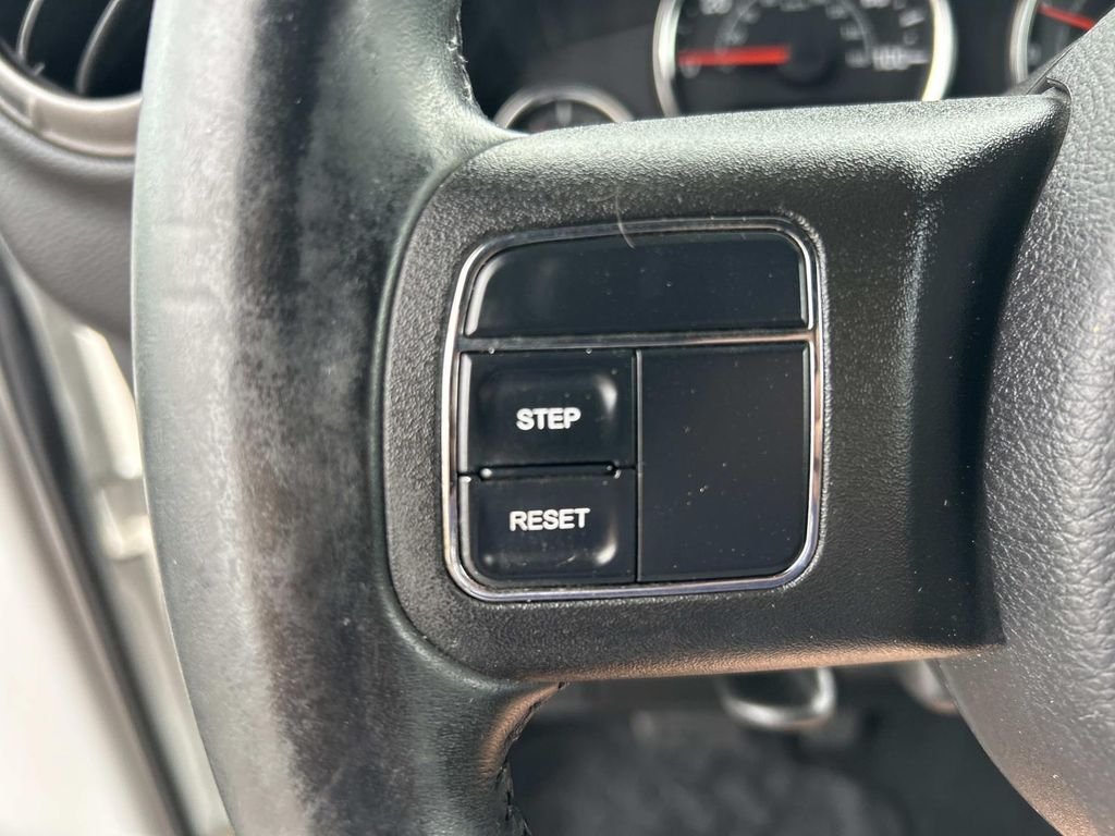 Used 2012 Bright White Jeep Unlimited Sport image 24