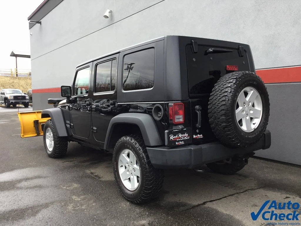 Used 2010 Black Jeep Unlimited Sport image 8