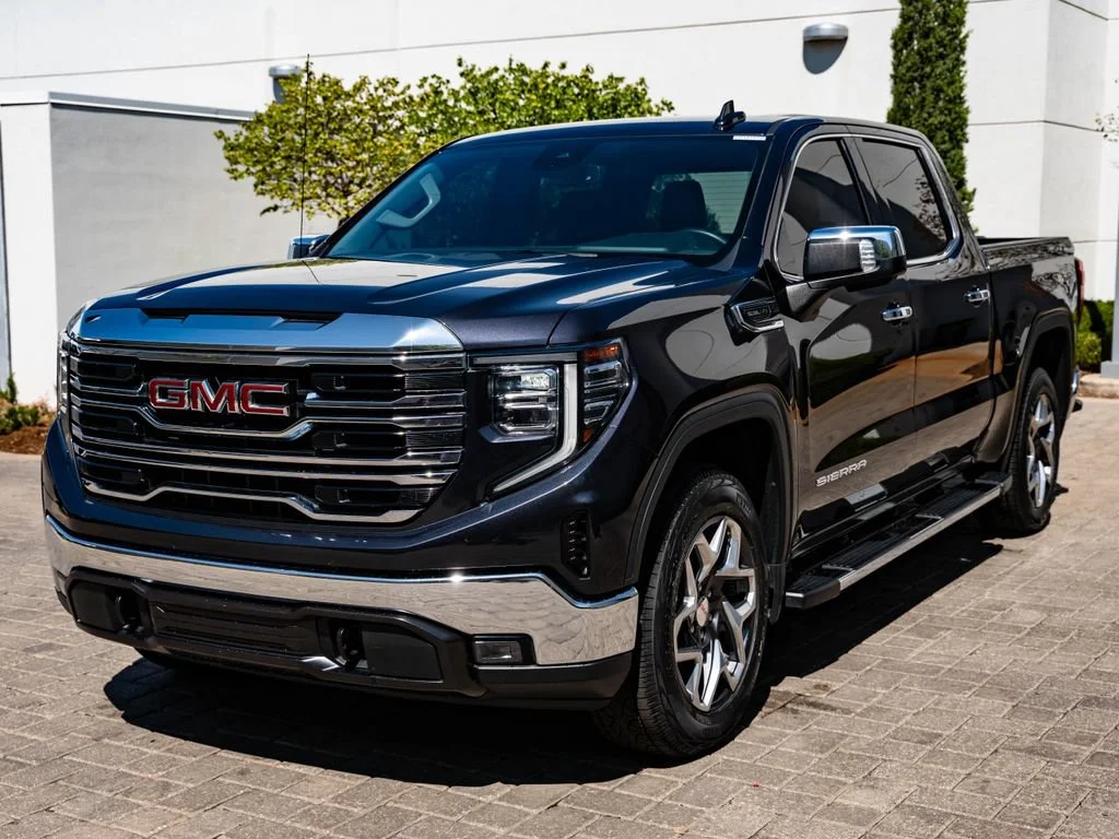 Used 2023 Titanium Rush Metallic GMC SLT image 1