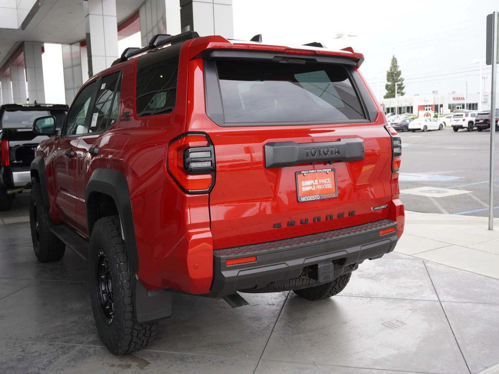 New 2026 Supersonic Red Toyota Hybrid TRD Off Road image 12