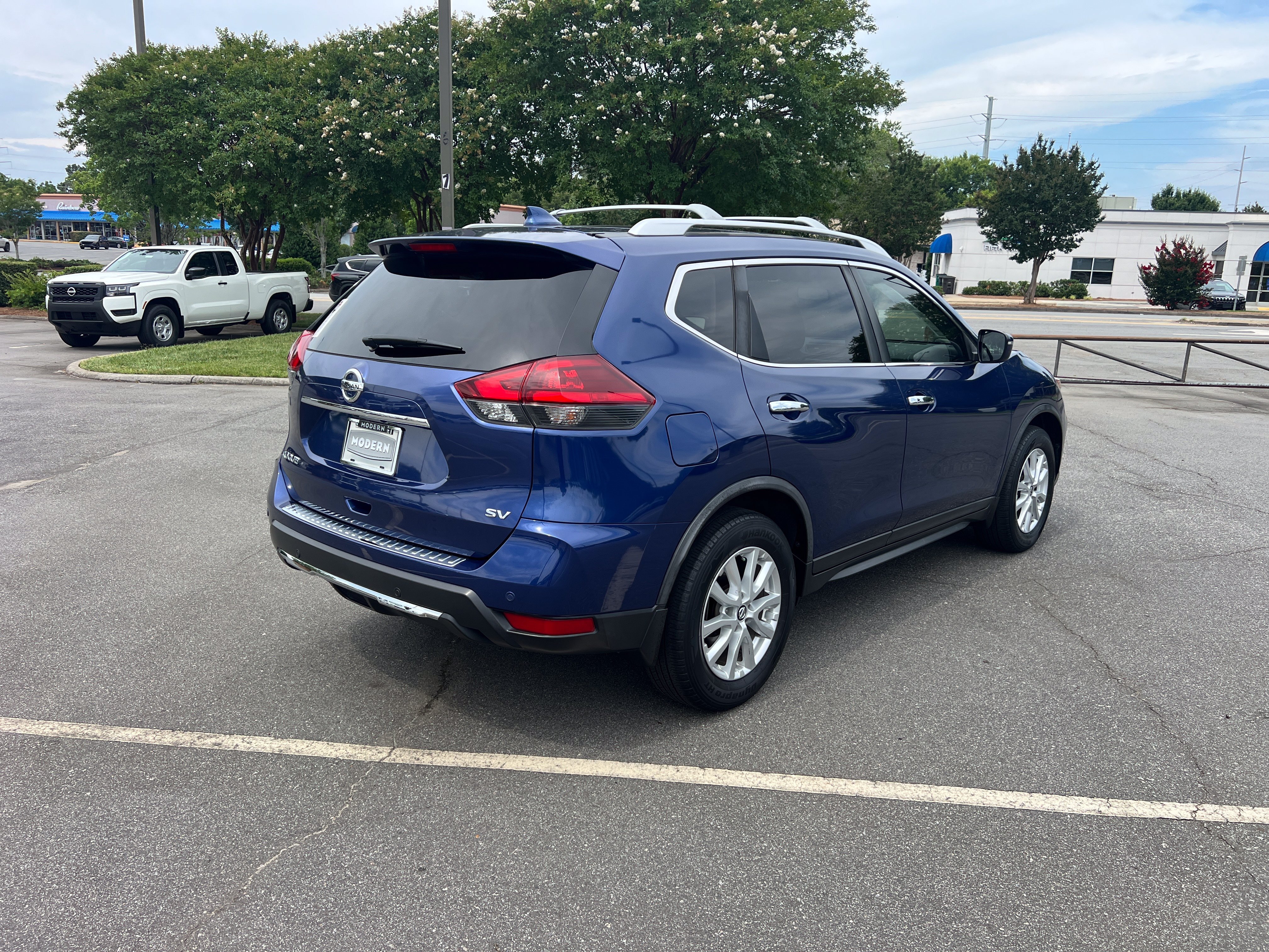 Used 2019 Caspian Blue Metallic Nissan SV image 5