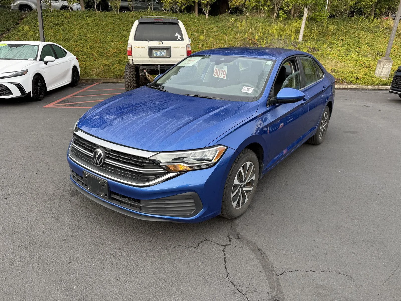Used 2024 Rising Blue Metallic Volkswagen S image 1