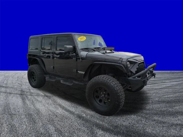 Used 2012 Jeep Wrangler Unlimited Rubicon with VIN 1C4BJWFG6CL266056 for sale in Palm Bay, FL