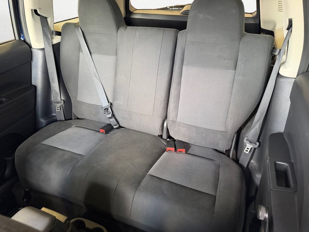 Used 2016 Blue Jeep Sport image 9