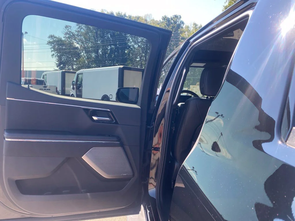 Used 2025 Onyx Black GMC Max Range Denali image 16