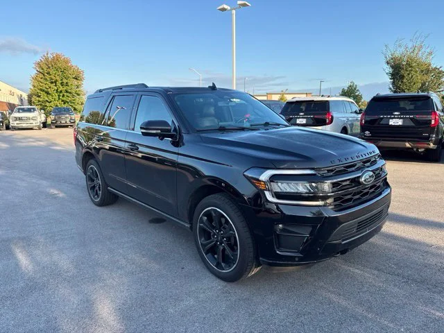 Used 2023 Agate Black Metallic Ford Limited image 1