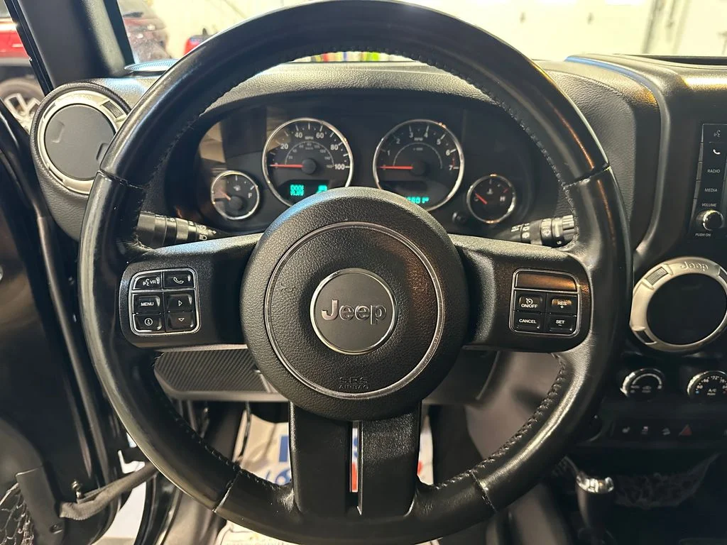 Used 2016 Black Jeep Unlimited Sahara image 16