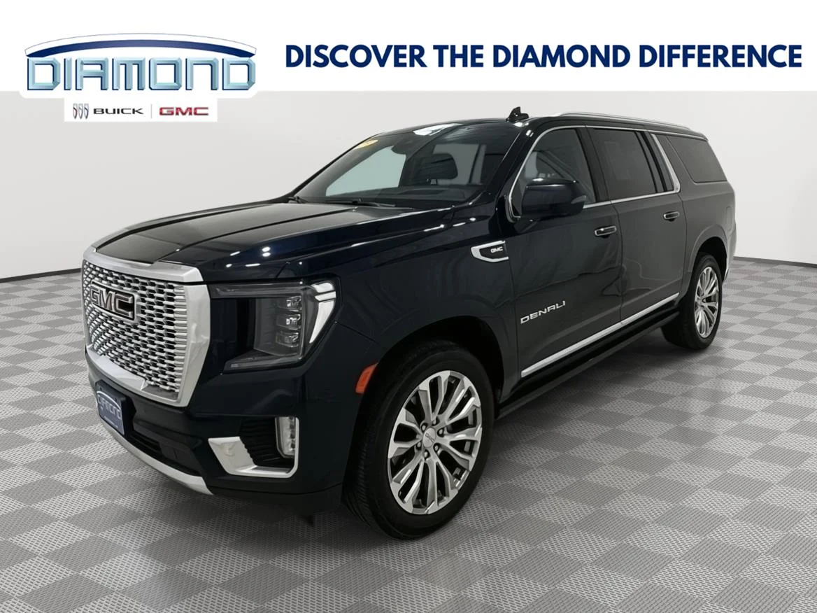 Used 2023 Midnight Blue Metallic GMC Denali image 1