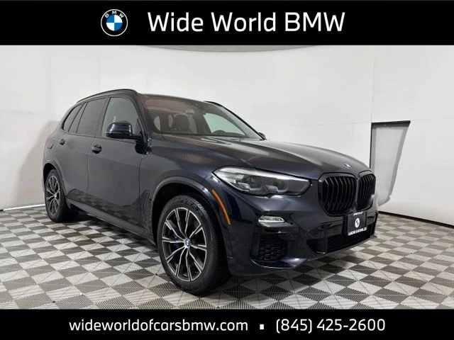 Used 2020 Carbon Black Metallic BMW xDrive40i image 1