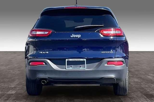 Used 2016 Blue Jeep Sport image 4