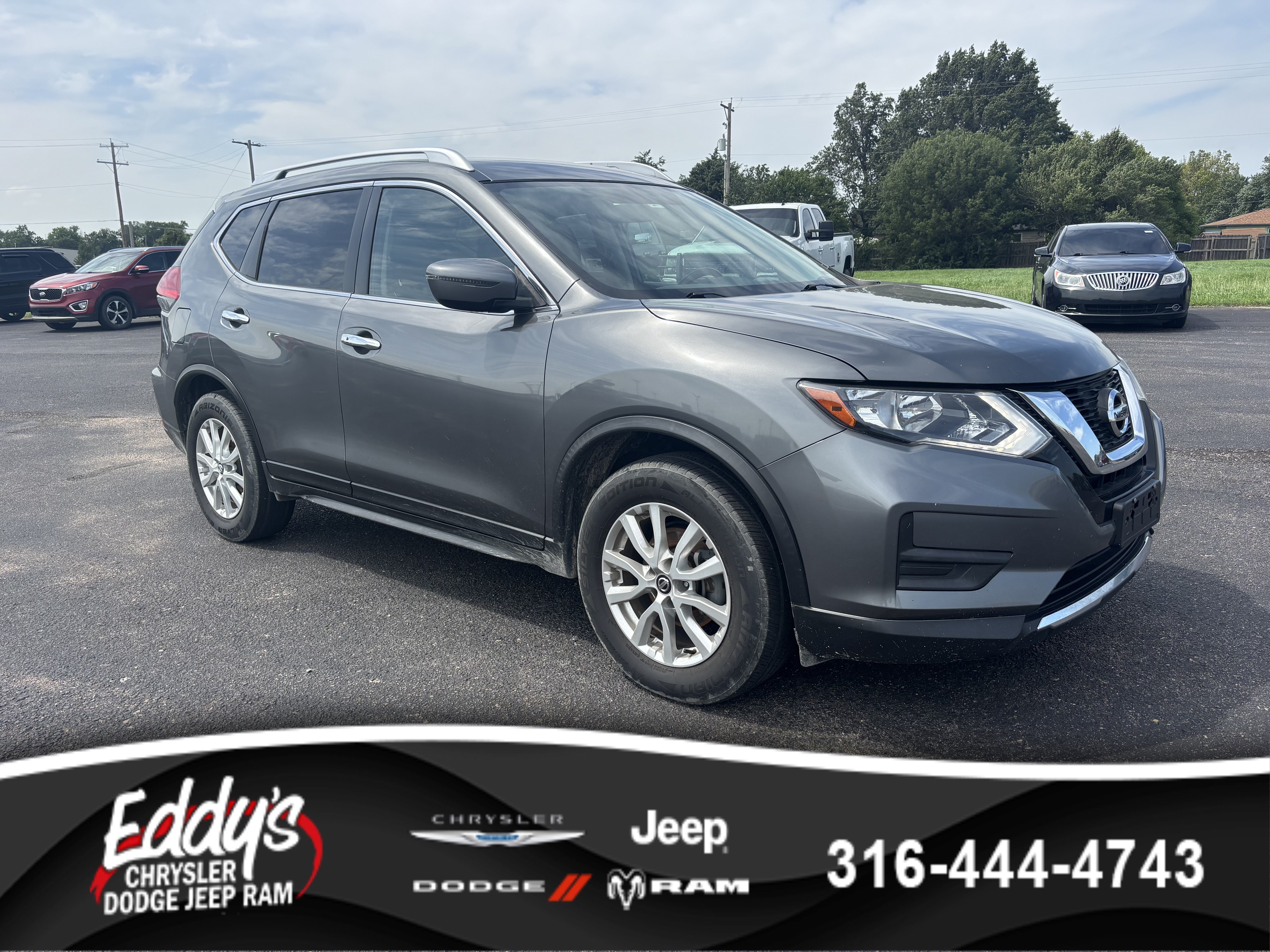 Used 2017 Gun Metallic Nissan SV image 1