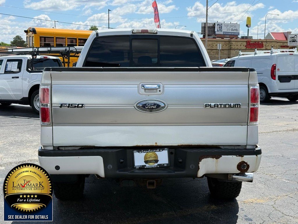 Used 2013 White Platinum Metallic Tri-Coat Ford 4WD SuperCrew 145" Platinum image 6