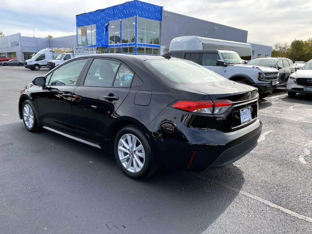 Used 2025 Midnight Black Metallic Toyota LE image 5