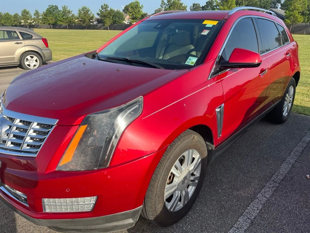 Used 2015 Crystal Red Tint Cadillac Luxury image 1