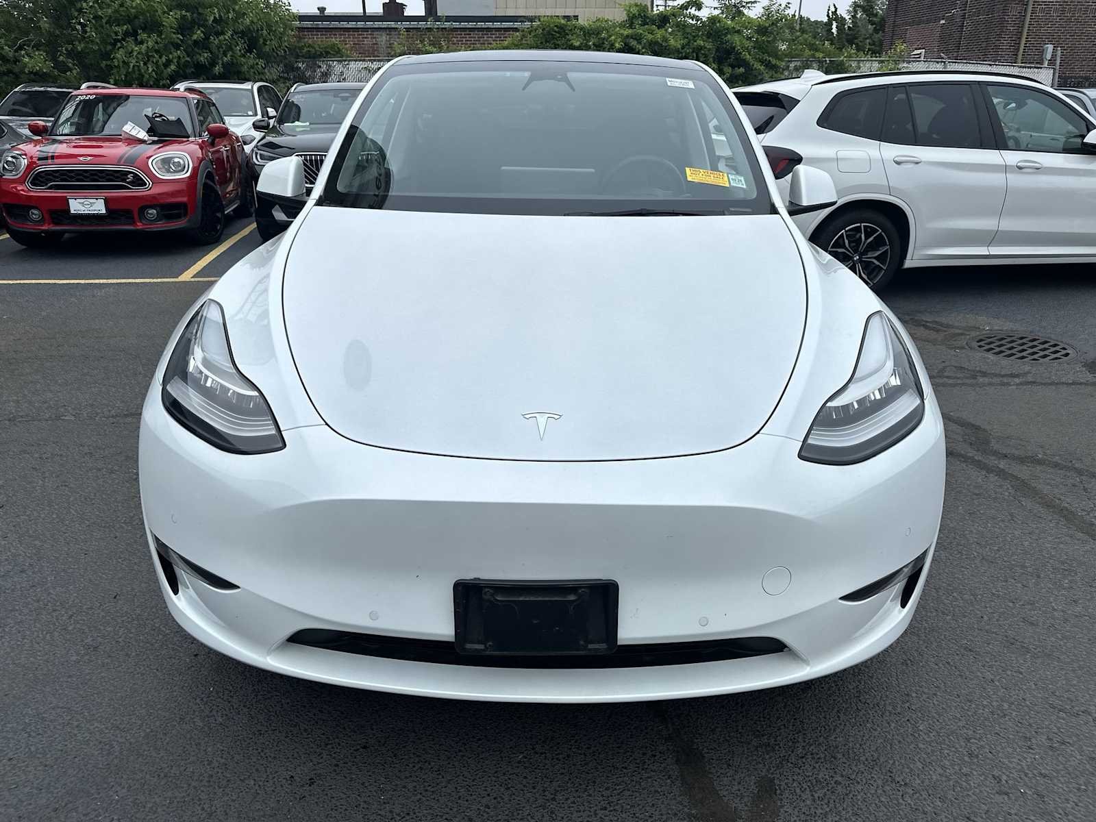 Used 2022 Tesla Model Y Long Range with VIN 7SAYGDEE2NA010239 for sale in Freeport, NY