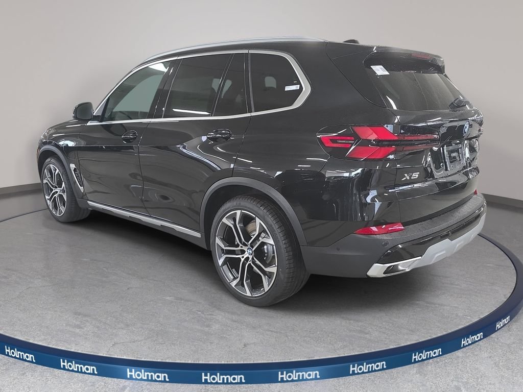 New 2026 Black Sapphire Metallic BMW xDrive50e image 6