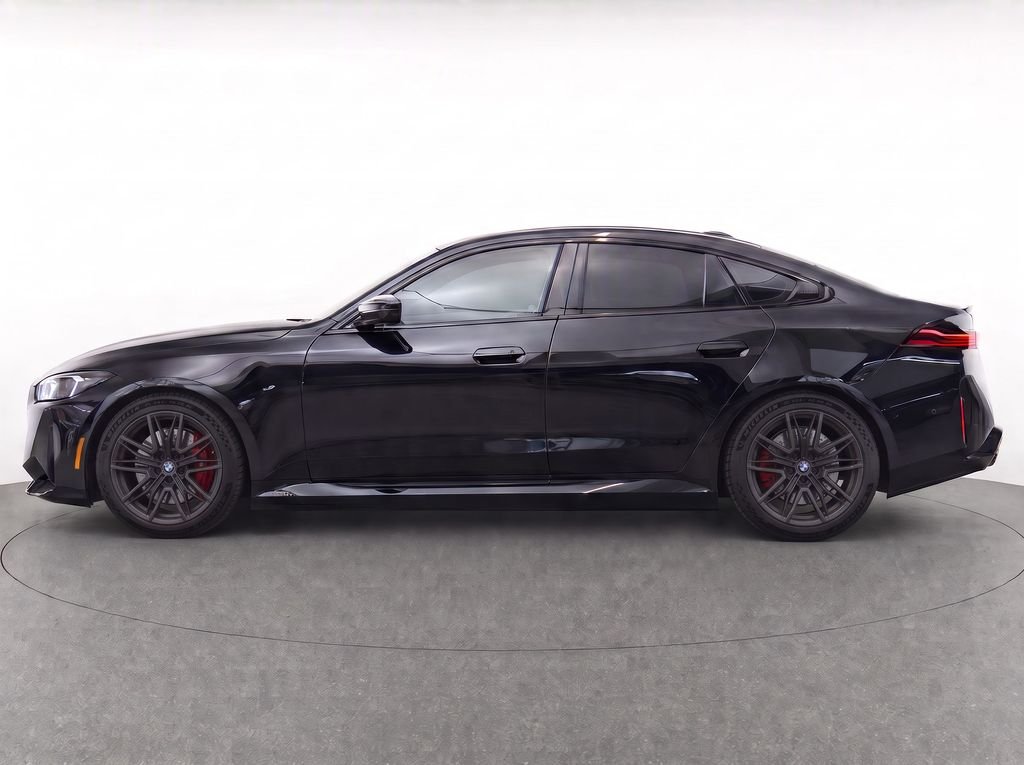 Used 2025 Black Sapphire Metallic BMW Base image 2