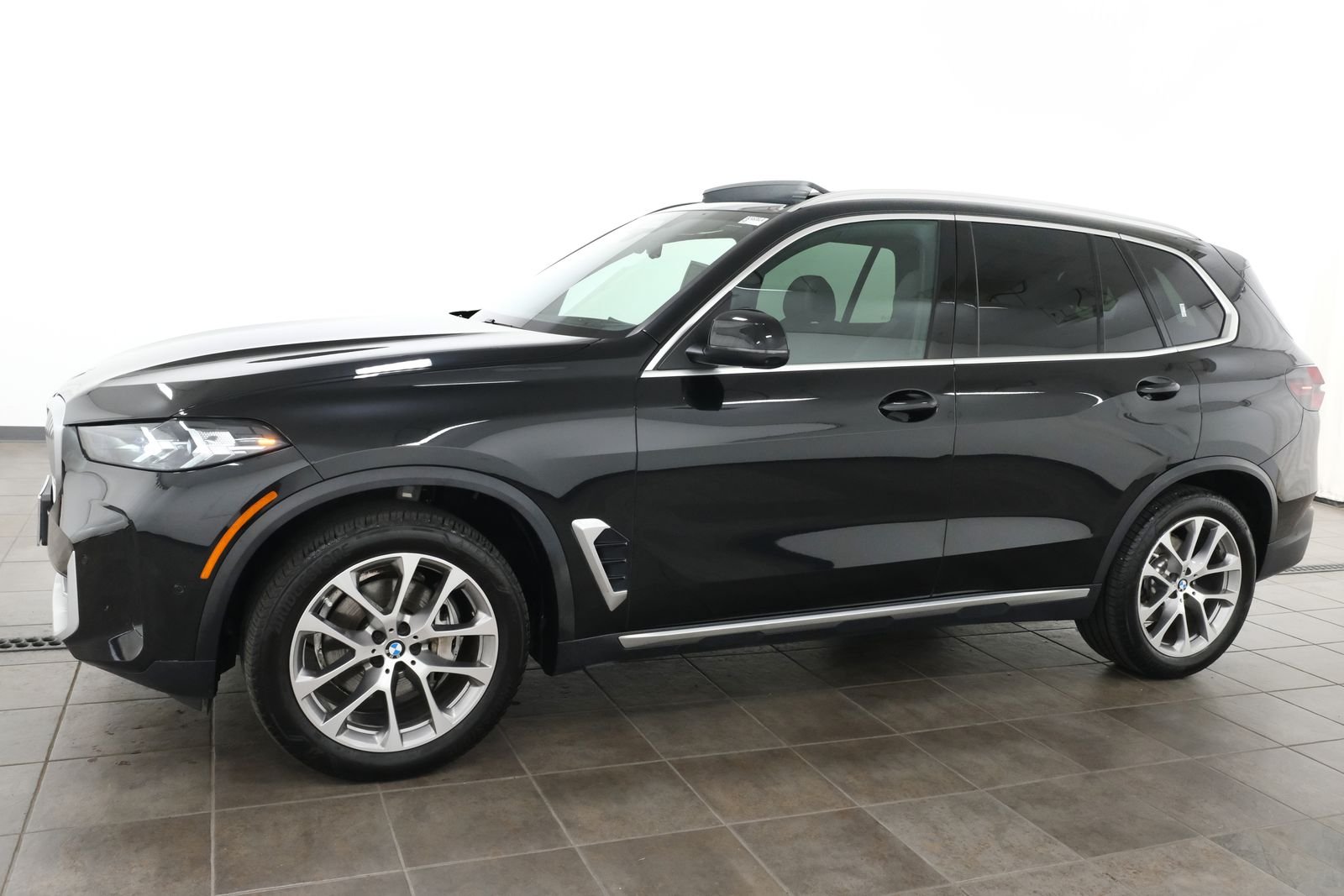 Certified Used 2024 Black Sapphire Metallic BMW xDrive40i image 2
