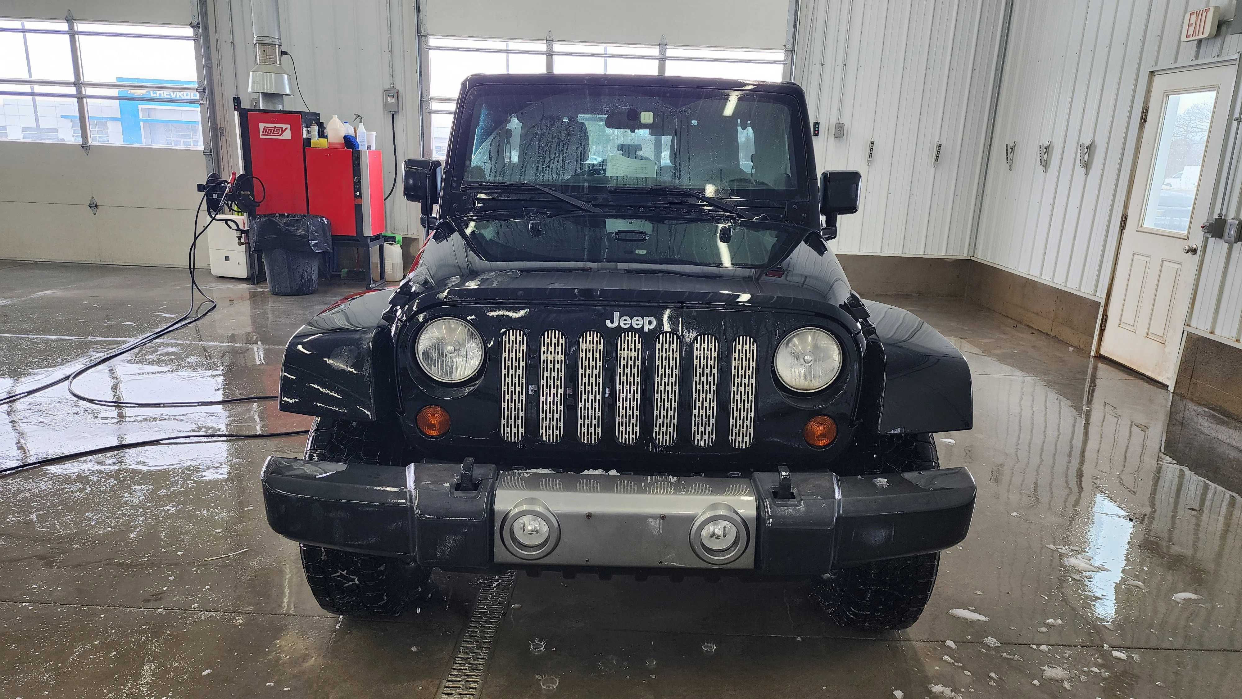 Used 2011 Jeep Wrangler Unlimited Sport with VIN 1J4BA3H15BL615692 for sale in Lake City, IA
